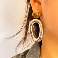 Two-tone gold and silver earrings